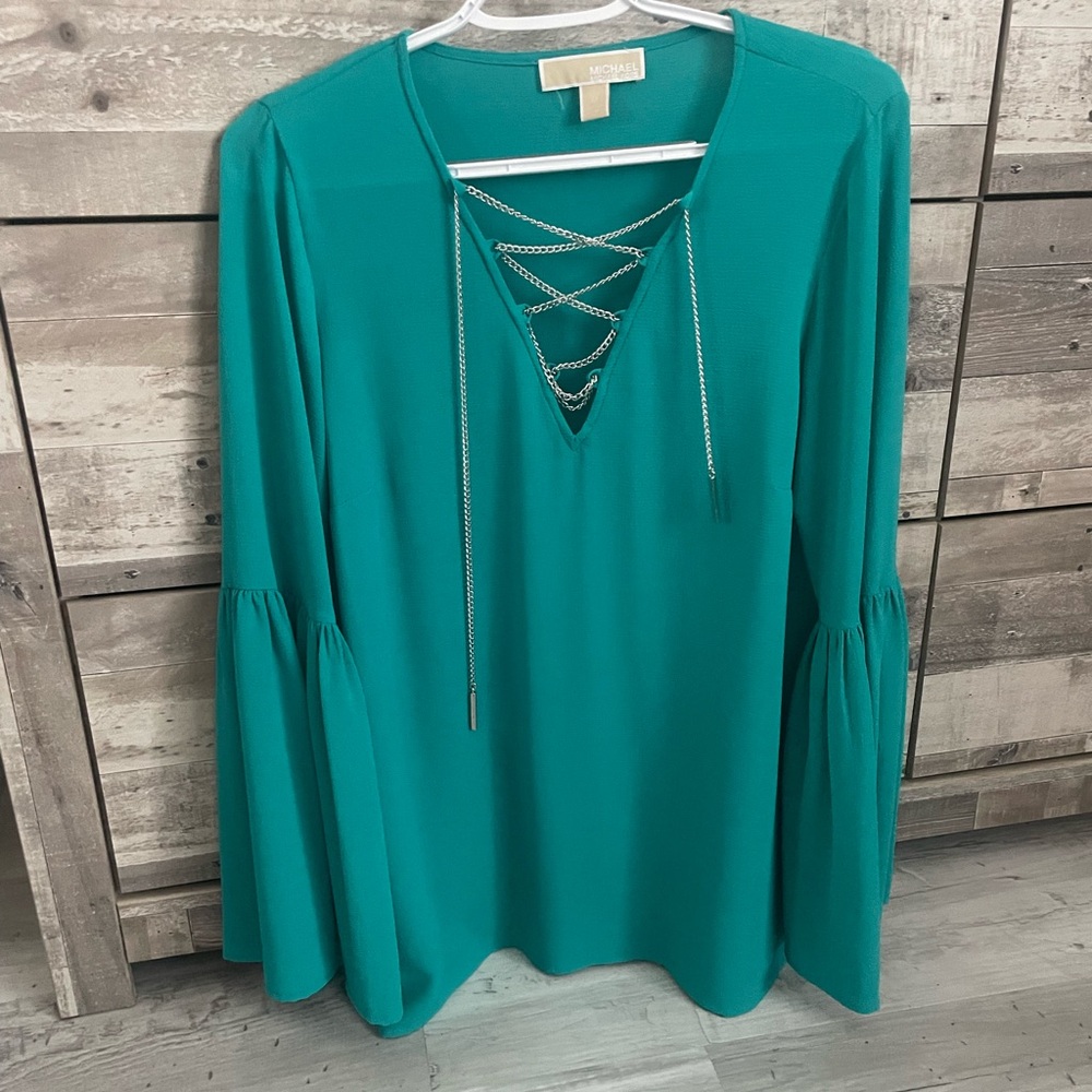 MK peplum long sleeve top